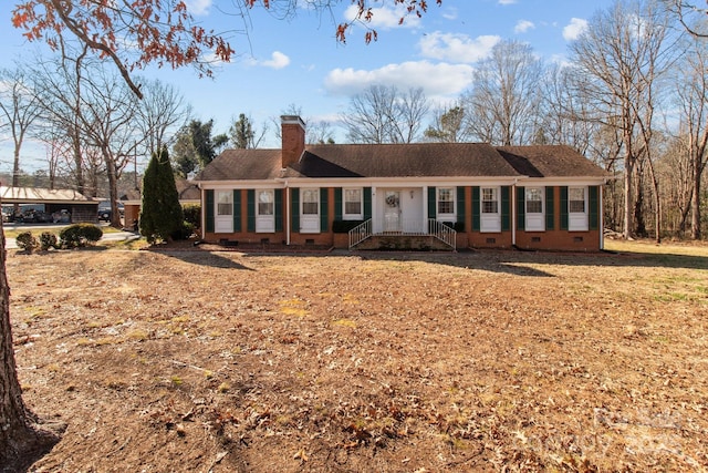 ranch-style house with a front yard