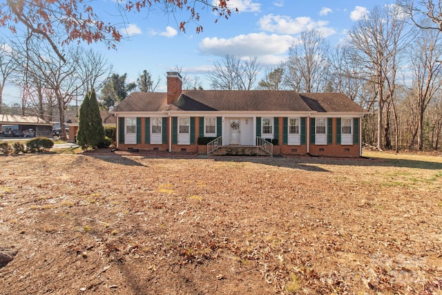 single story home with a front yard