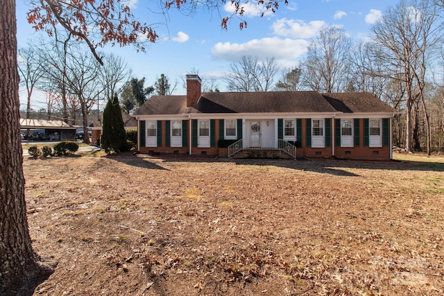 single story home with a front yard