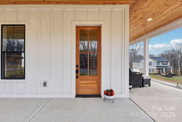 entrance to property featuring a patio area