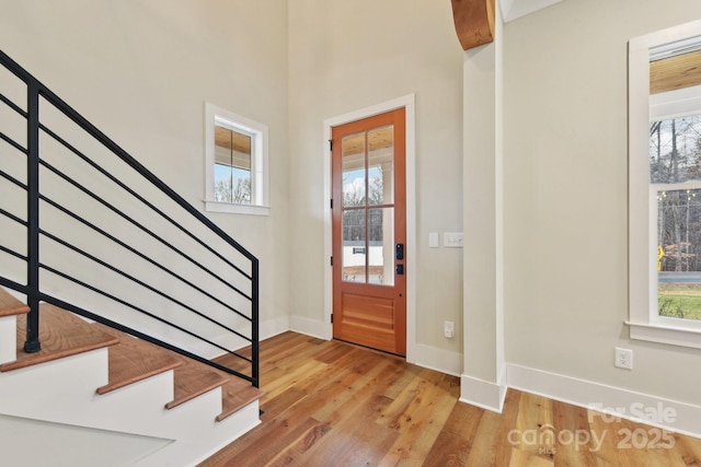 foyer entrance featuring hardwood / wood-style flooring