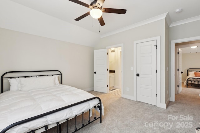 bedroom featuring ceiling fan, light carpet, crown molding, and lofted ceiling