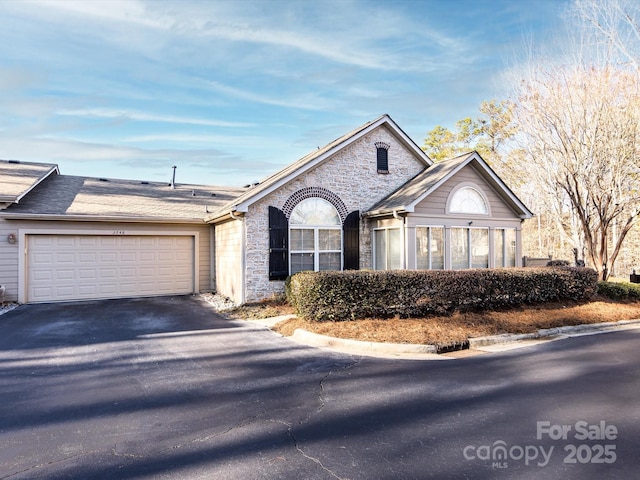 view of front of property featuring a garage