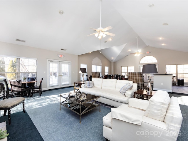 living room with carpet, ceiling fan, high vaulted ceiling, and french doors