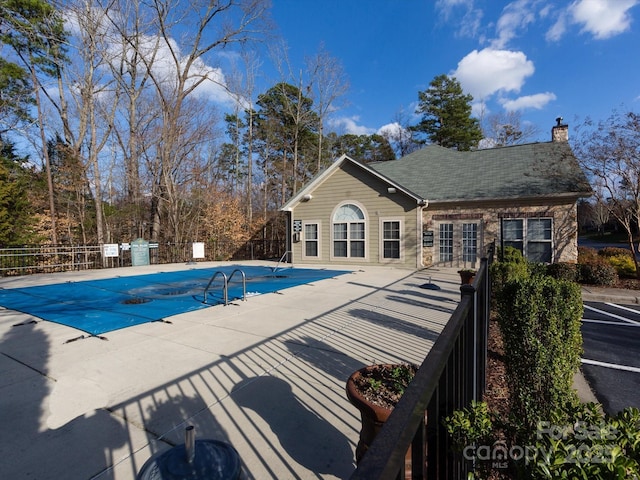 view of pool with a patio