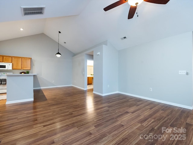 unfurnished living room with high vaulted ceiling, ceiling fan, and dark wood-type flooring