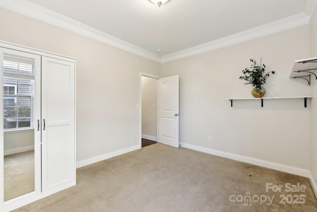 unfurnished bedroom featuring light carpet and ornamental molding