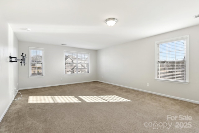 view of carpeted spare room