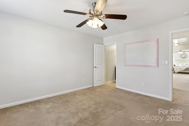 unfurnished bedroom with ceiling fan and light carpet