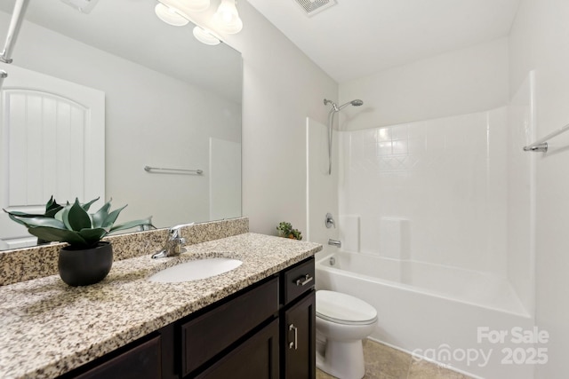 full bathroom with bathing tub / shower combination, vanity, and toilet