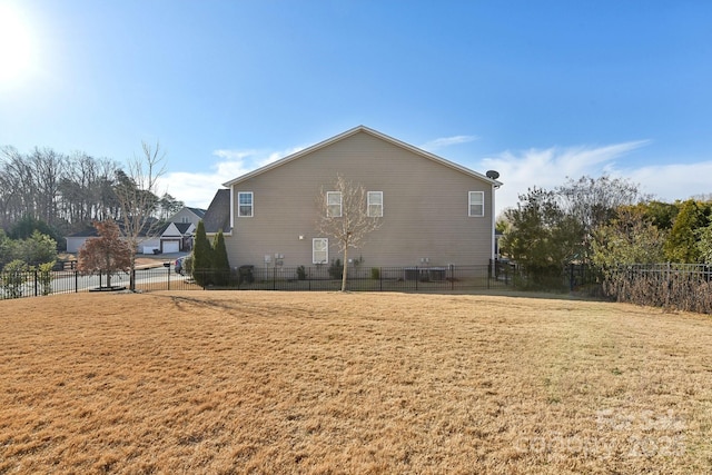 view of home's exterior featuring a yard