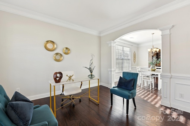 office featuring a notable chandelier, ornamental molding, decorative columns, and dark hardwood / wood-style floors