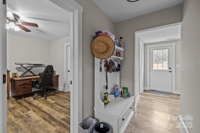 interior space featuring ceiling fan and light wood-type flooring