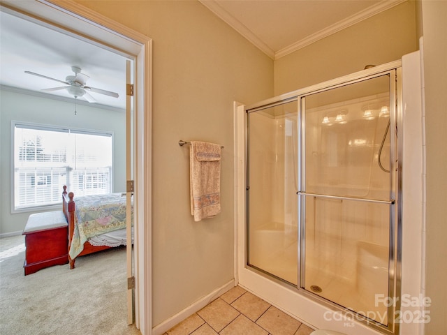 bathroom with walk in shower, tile patterned floors, ceiling fan, and crown molding