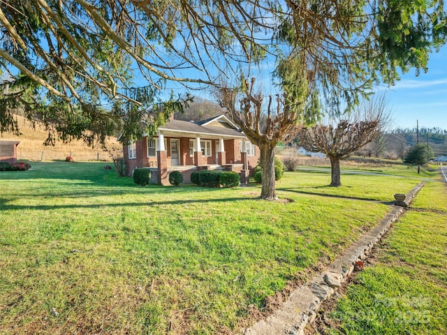 view of yard with a porch