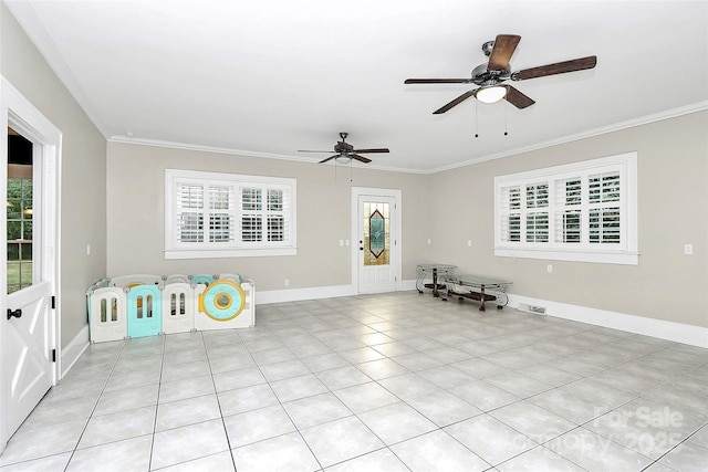 interior space with crown molding, ceiling fan, and light tile patterned floors