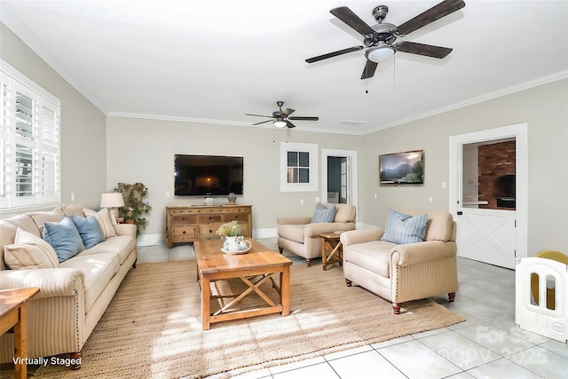 tiled living room featuring ceiling fan and ornamental molding