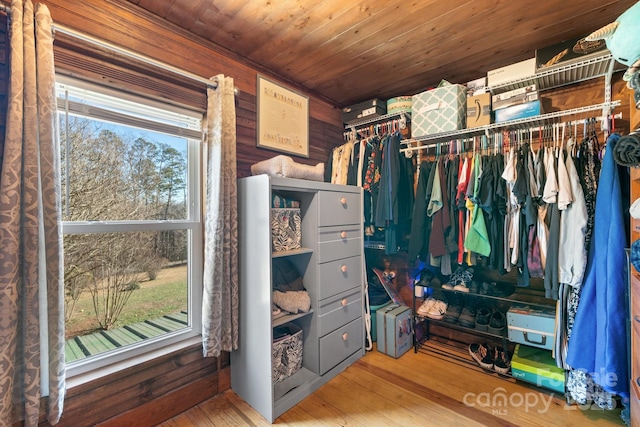 spacious closet featuring hardwood / wood-style flooring