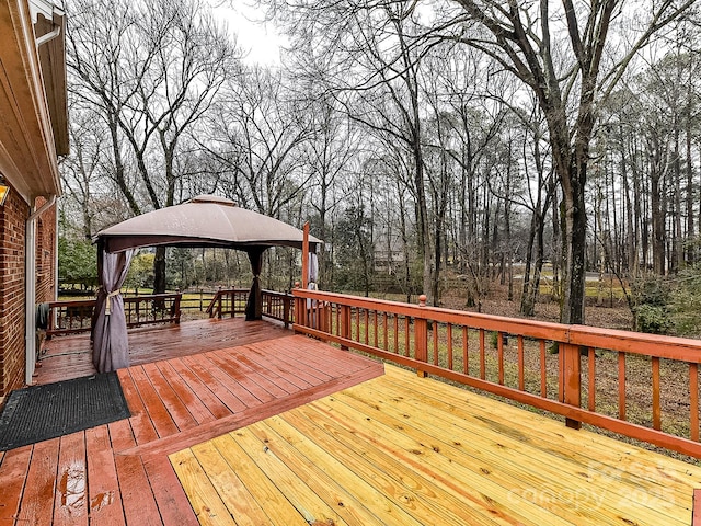 wooden deck with a gazebo