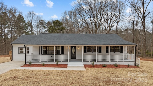 single story home with a front lawn and a porch