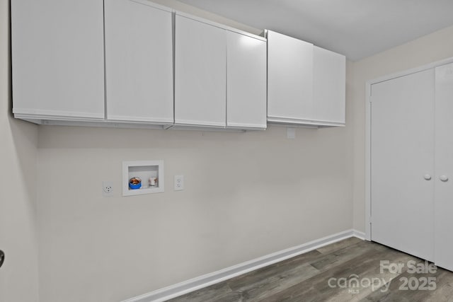 washroom with electric dryer hookup, dark hardwood / wood-style flooring, cabinets, and hookup for a washing machine