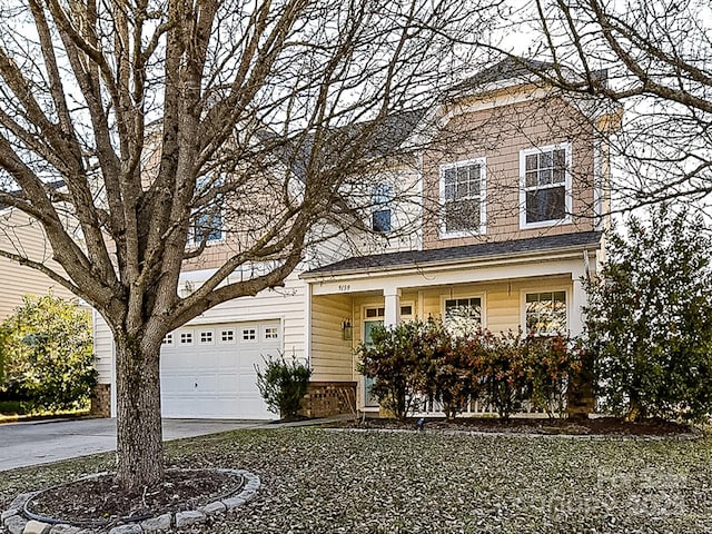 front of property with a garage