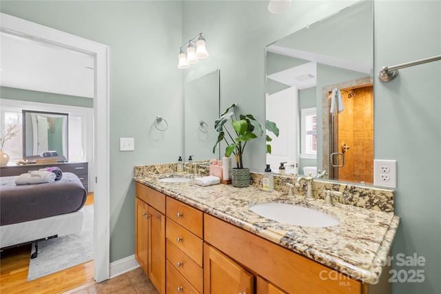 bathroom with vanity and an enclosed shower