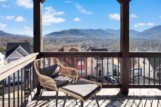 wooden deck featuring a mountain view