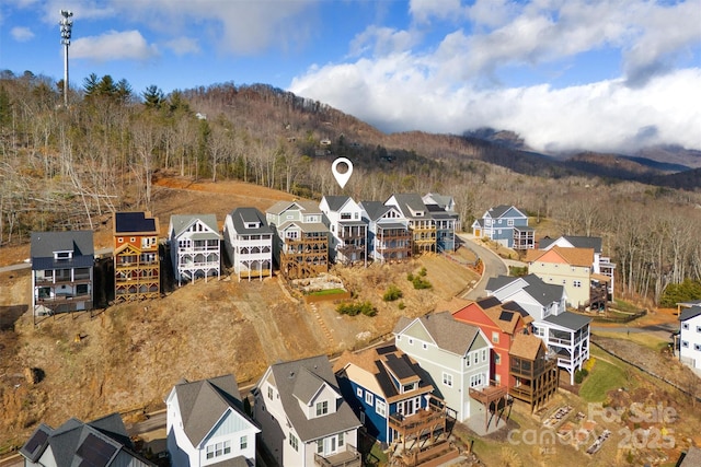 drone / aerial view featuring a mountain view