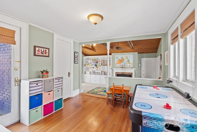 game room with wood-type flooring