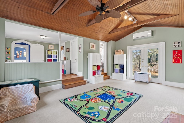 playroom featuring french doors, wood ceiling, light colored carpet, ceiling fan, and an AC wall unit