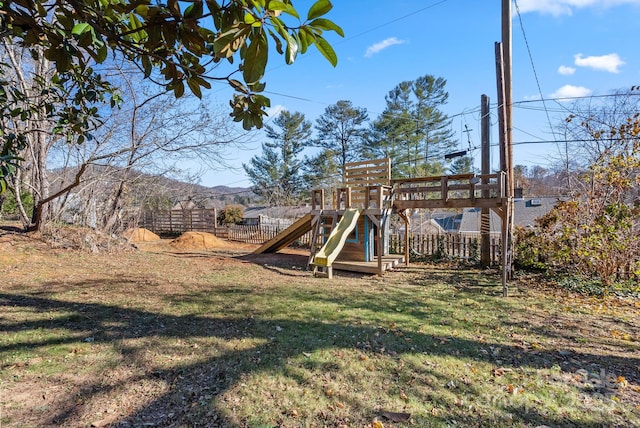 view of play area with a yard