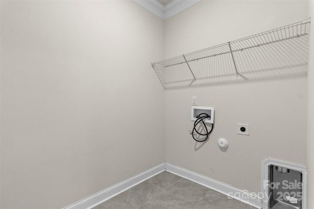 clothes washing area with electric dryer hookup, hookup for a gas dryer, tile patterned flooring, crown molding, and hookup for a washing machine