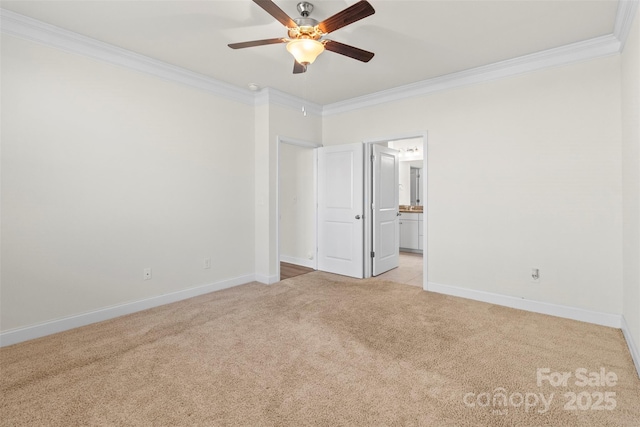 carpeted empty room with crown molding and ceiling fan