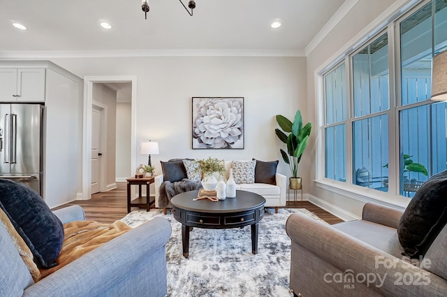 living room with dark wood-type flooring and ornamental molding