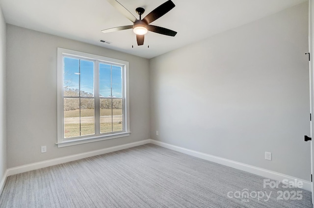 carpeted empty room with ceiling fan