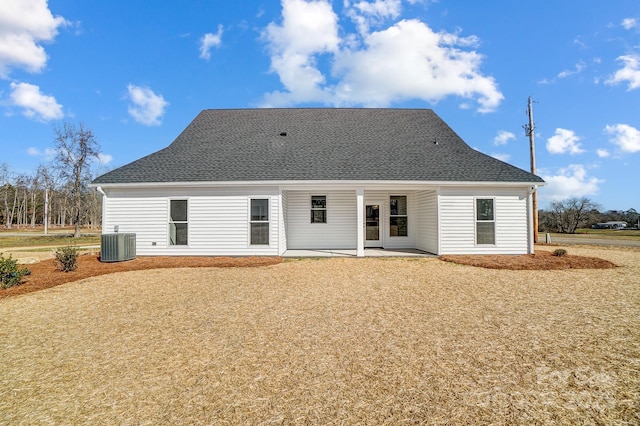 rear view of house featuring central AC and a patio