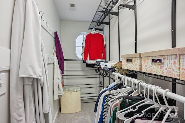 spacious closet with carpet and visible vents