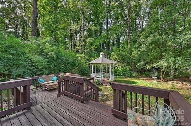 wooden terrace with a gazebo