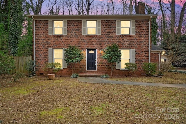 view of front of home featuring a lawn