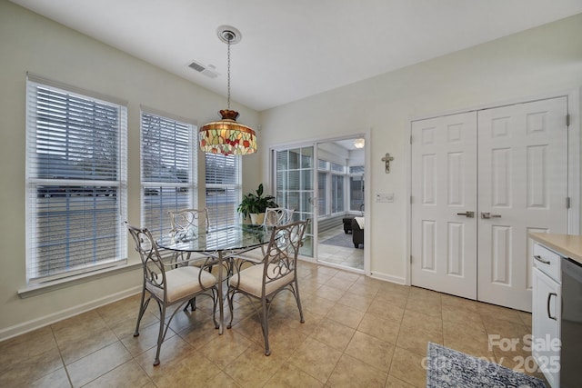 view of tiled dining space