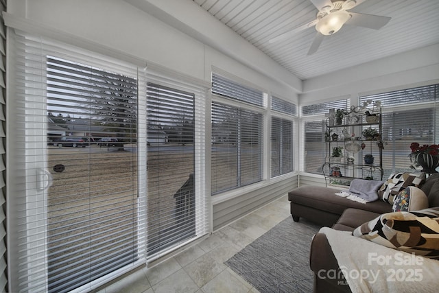 sunroom / solarium with ceiling fan