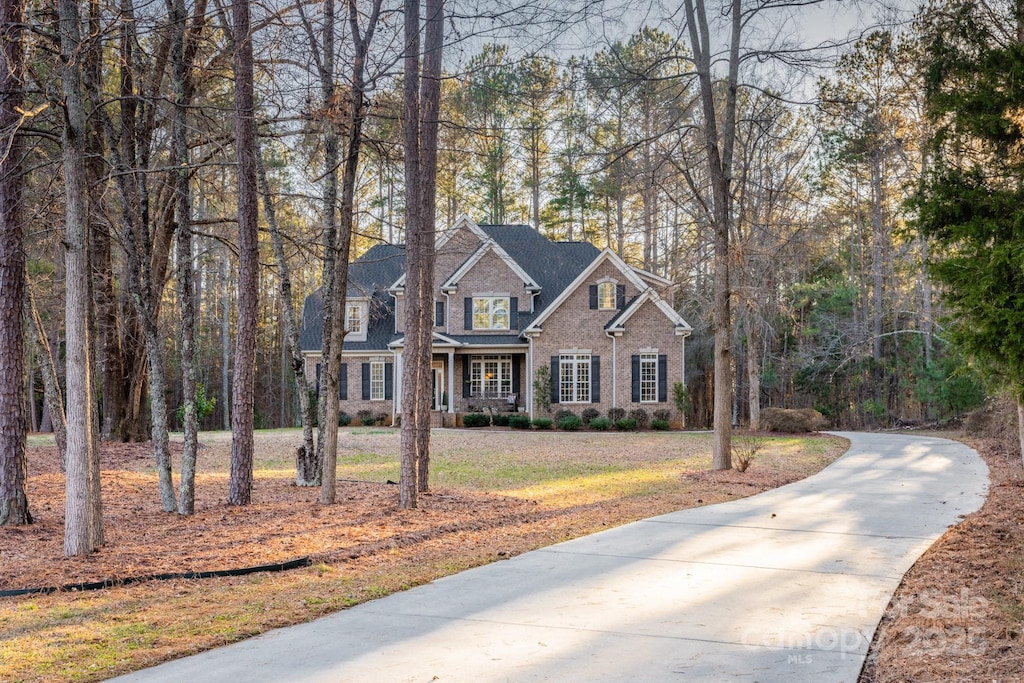 view of front of home with a front yard