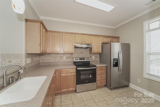 kitchen with light tile patterned floors, appliances with stainless steel finishes, crown molding, and sink