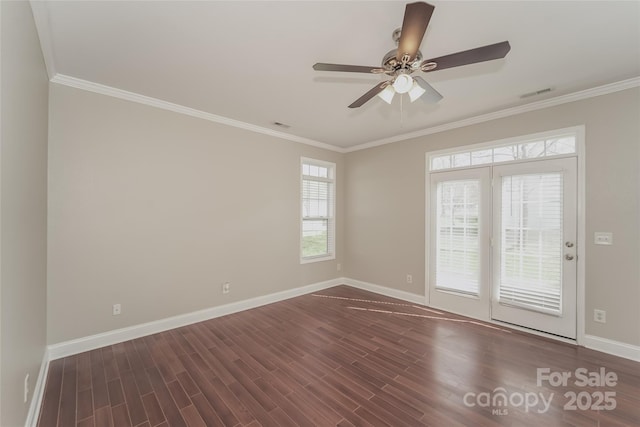 unfurnished room with ornamental molding, ceiling fan, and dark hardwood / wood-style flooring