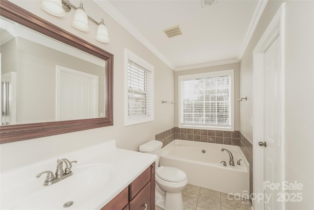 bathroom featuring tile patterned flooring, toilet, a bathtub, vanity, and crown molding