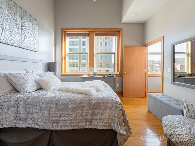 bedroom with light hardwood / wood-style floors