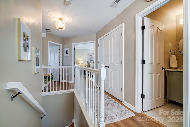 hallway featuring light wood-type flooring