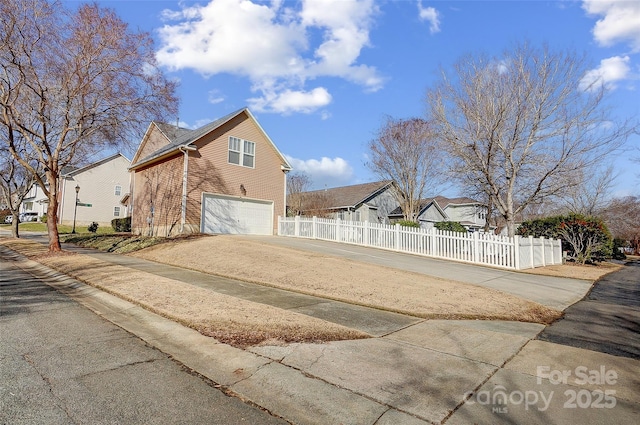 view of home's exterior with a garage