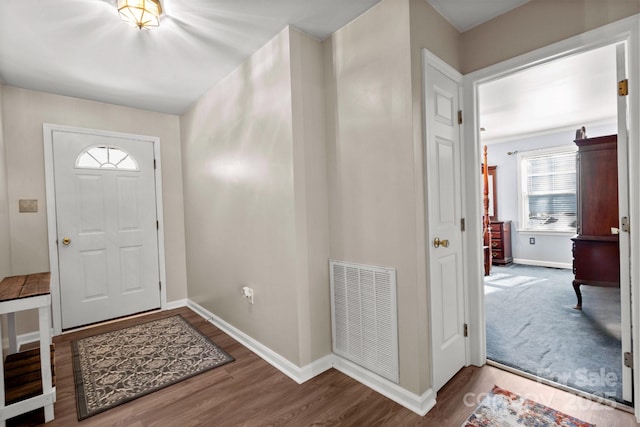 foyer entrance featuring hardwood / wood-style floors